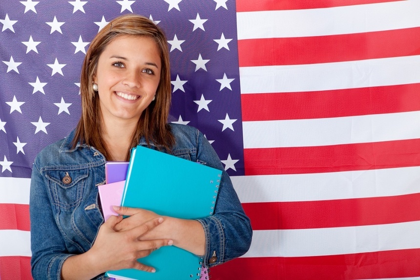 English female student with the British flag at the background
