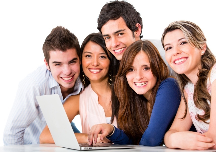 Group of friends with a laptop computer isolated over white